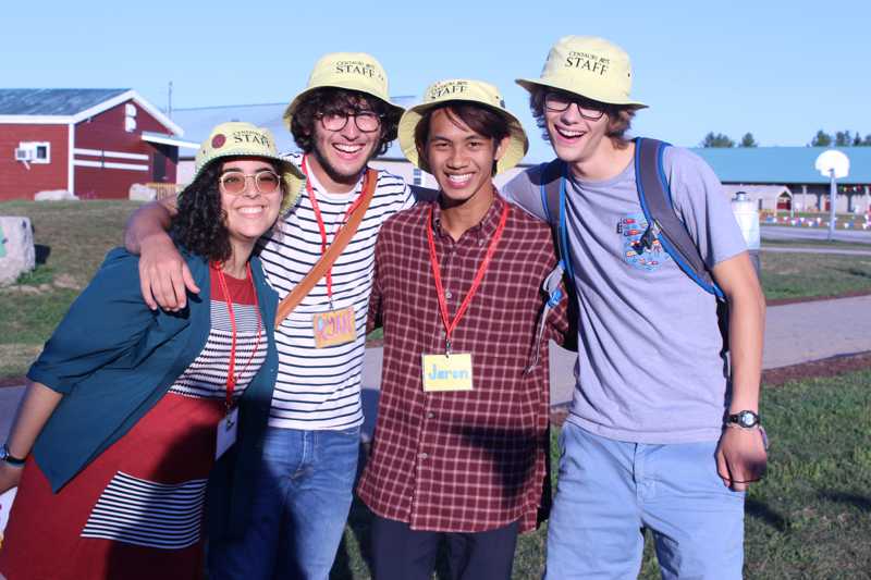 Group of staff wearing yellow hats